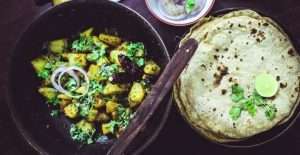 Baked roti - one of the dishes you must try when traveling to India