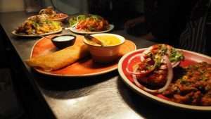 Masala dosa and other dishes served on the table.